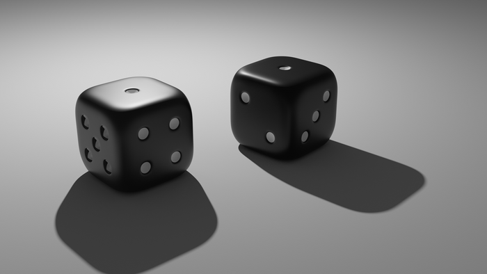Two black dice on a simple background