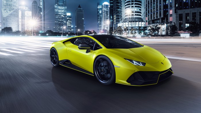 Yellow Lamborghini Huracan EVO RWD in city at night
