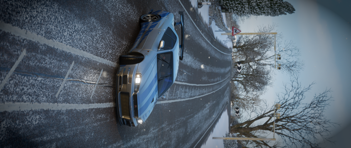 Nissan Skyline GT-R R34 on a snowy road