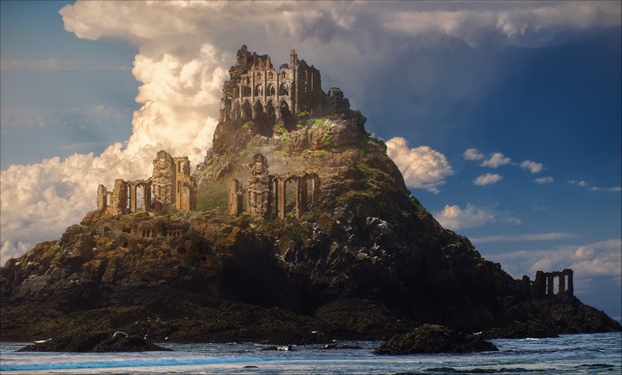 Ruined castle on a rocky island in the sea