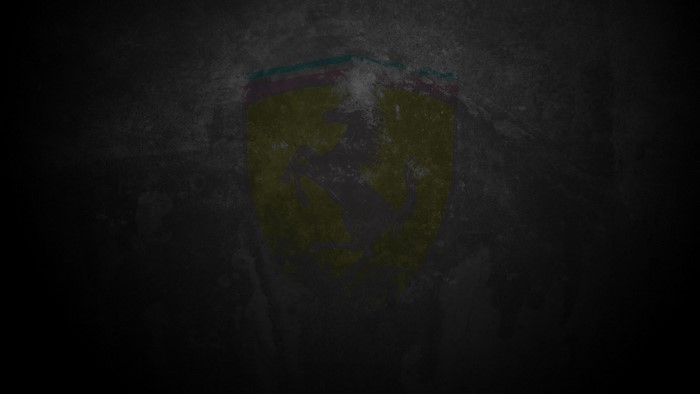Ferrari logo on dark background