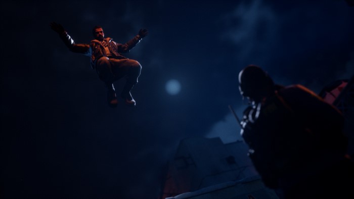Man falling from sky towards another person in dark.