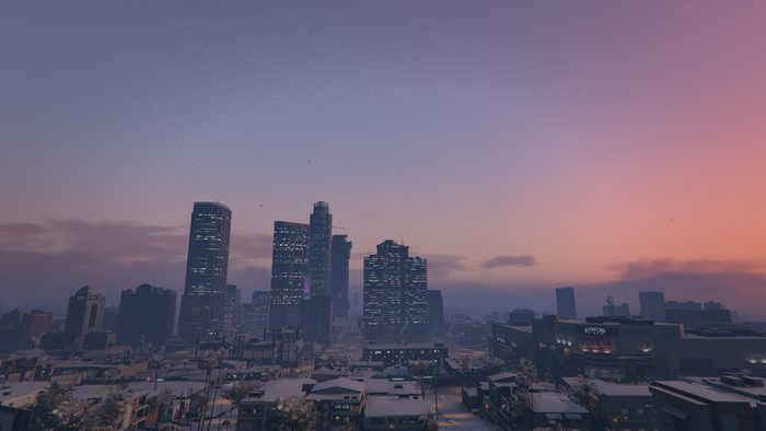 4K Los Santos cityscape at sunset with snow