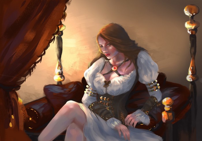Woman in white dress sitting on a leather couch