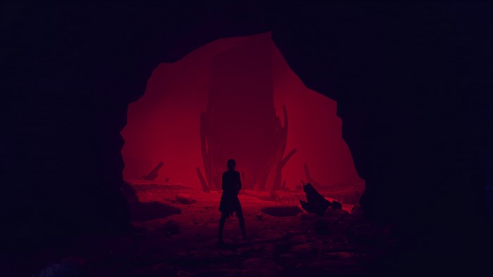 Jesse Faden from Control in a red cave