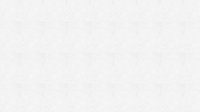 White textured wall with subtle scratches
