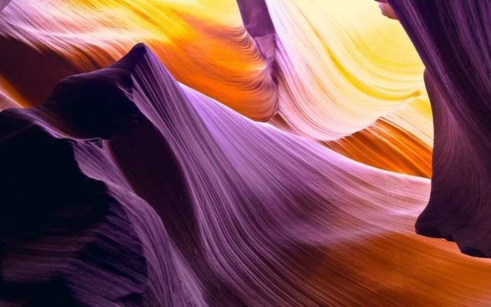 Sunlight on colorful sandstone rock formation