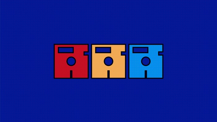 Three floppy disks in red, orange, and blue