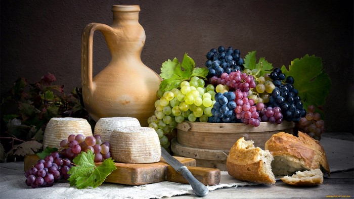 Still life with grapes, cheese, bread, and jug