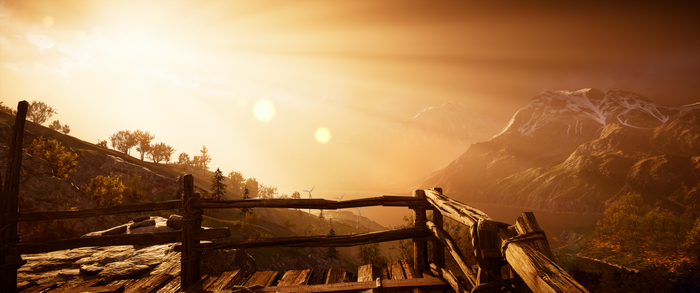 Assassin's Creed Valhalla landscape with mountains and wind turbines