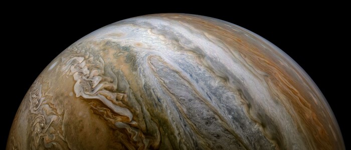 Jupiter's swirling clouds in space