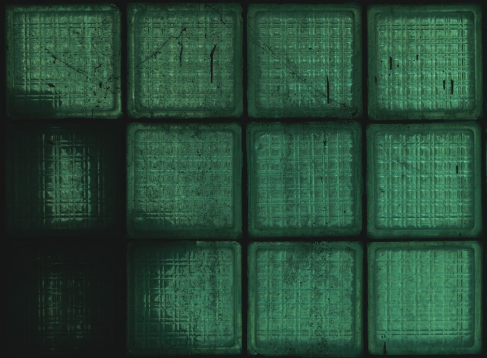 4K glass blocks in a dark, abandoned hospital