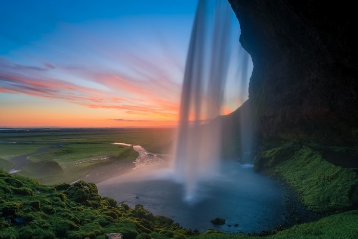 Waterfall in Iceland at Sunset with Long Exposure