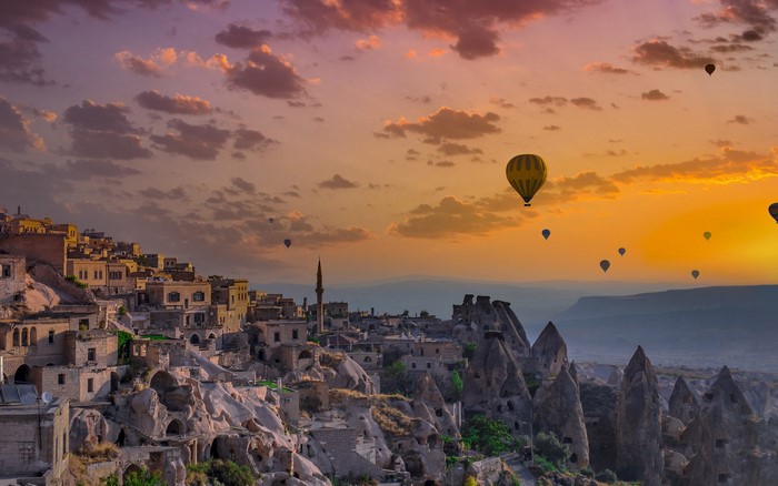 Hot air balloons over Cappadocia at sunset, Turkey