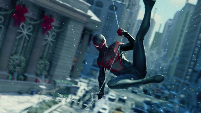 Spider-Man Miles Morales swinging through a snowy city