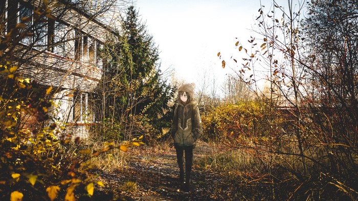 Anime girl in a forest with abandoned building
