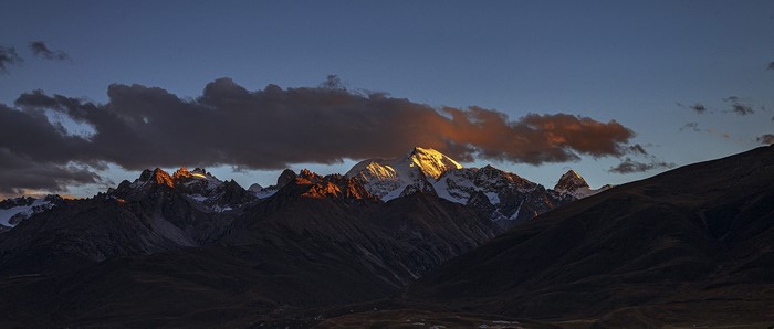 Mountains at sunset with clouds
