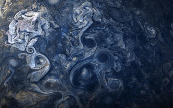 Jupiter's swirling clouds in deep space