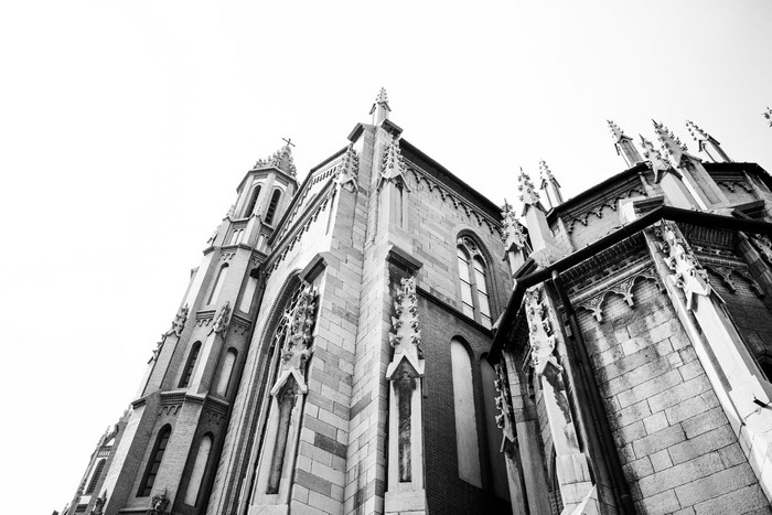 Monochrome low-angle view of a gothic church