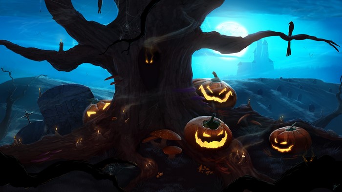 Halloween graveyard with carved pumpkins and a spooky tree