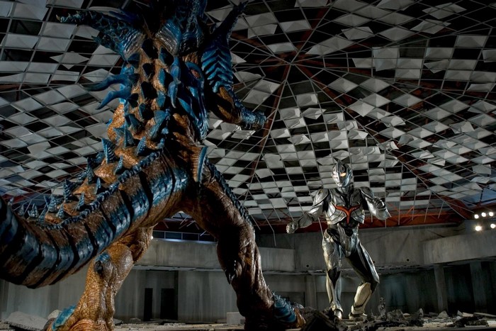 Ultraman vs. Kaiju in a ruined arena