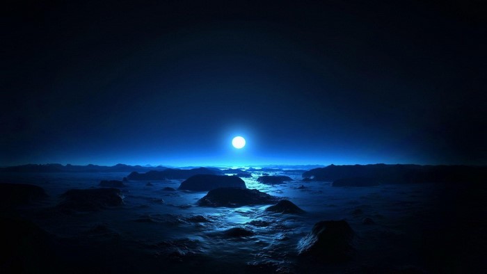 Moonlit alien landscape with rocky terrain