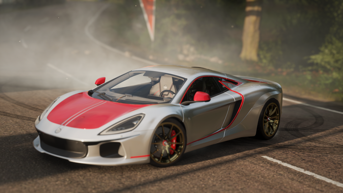 Silver and red sports car drifting on a road