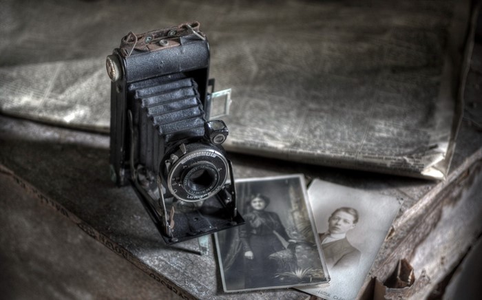 Vintage camera and old photographs