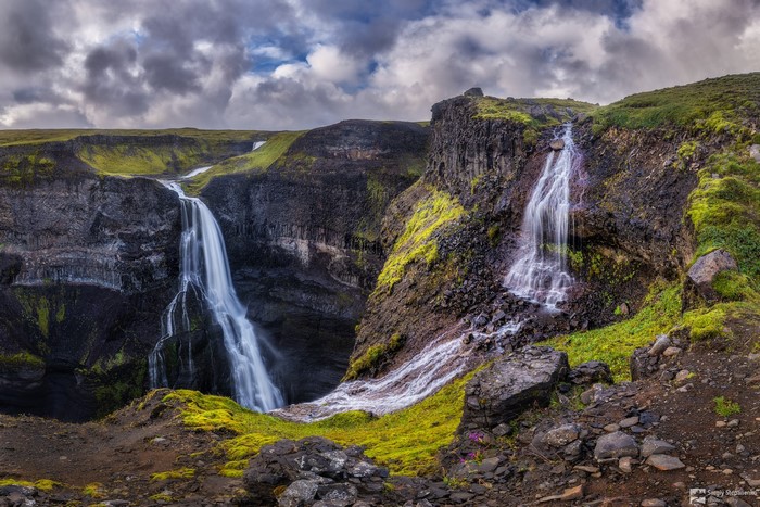 Haifoss waterfall in Iceland with dramatic clouds