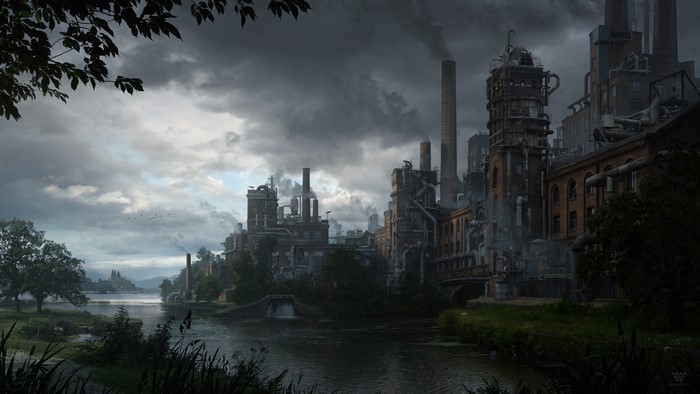 Industrial factory complex by a river under cloudy sky