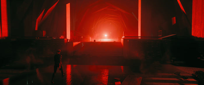 Jesse Faden from Control in a red chamber