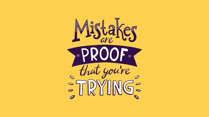 Motivational quote typography on yellow background