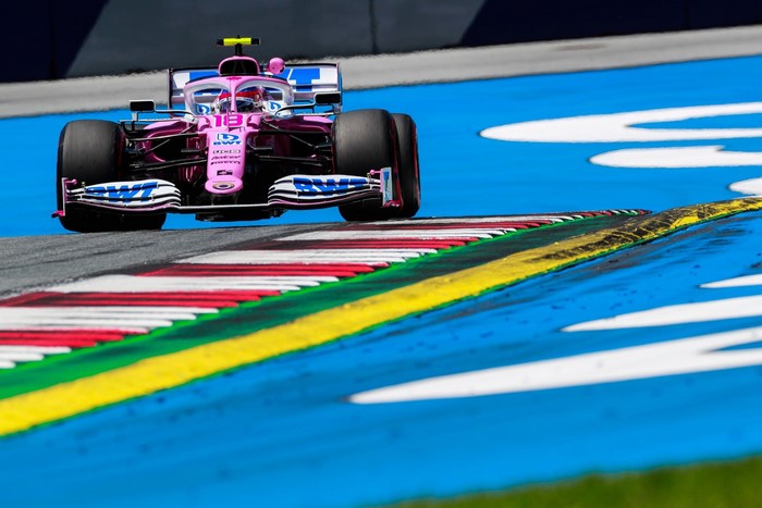Pink Racing Car with BWT Livery on Track