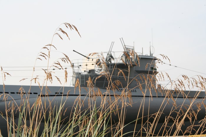 Submarine with dry grass in foreground