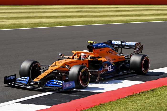 McLaren F1 car driven by Lando Norris on a race track