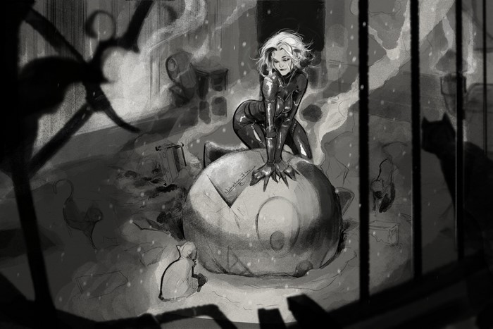 Catwoman on a large round object with cats