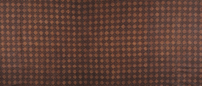 Brown fabric with a repeating geometric pattern