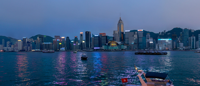 Hong Kong cityscape at dusk with Victoria Harbour