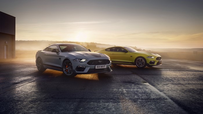 Ford Mustang Mach 1 cars at sunrise