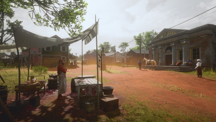 Red Dead Redemption 2: Rhodes street scene with market and bank