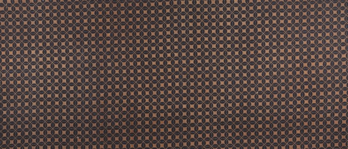 Brown fabric with a repeating geometric pattern