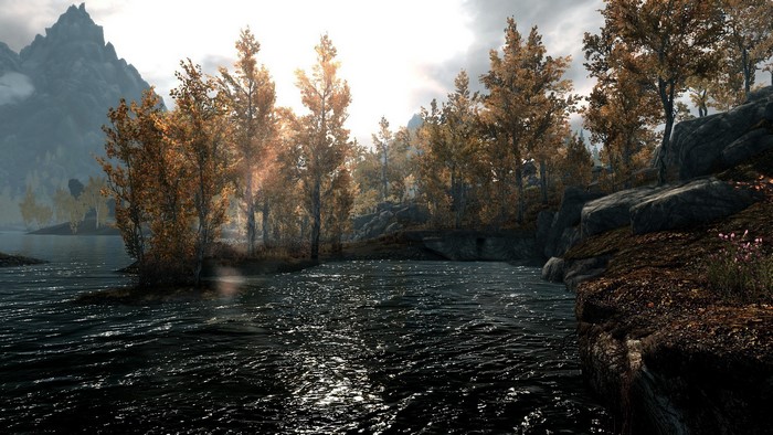 The Elder Scrolls V: Skyrim landscape with mountains and lake