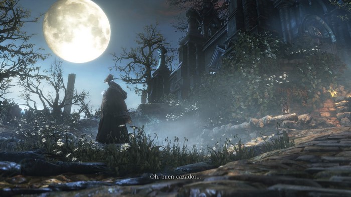 Bloodborne: A hunter stands under a large moon