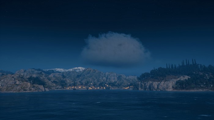 Assassin's Creed Odyssey screenshot of a coastal town at night