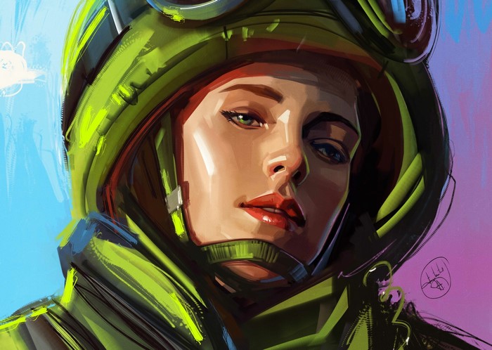 Woman in a green helmet and goggles