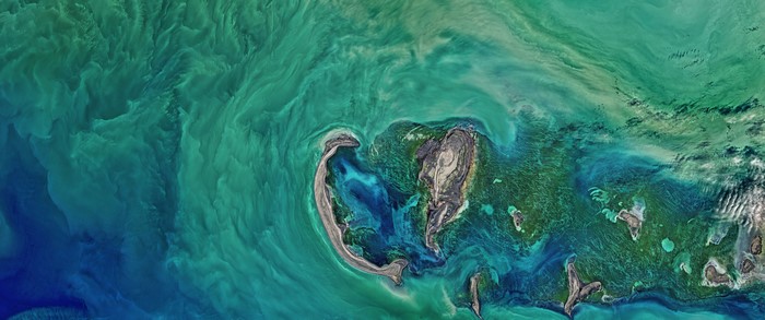 Aerial view of islands and turquoise ocean currents