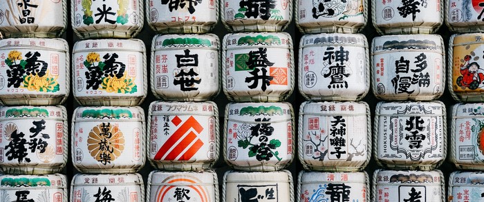 Japanese sake barrels with calligraphy