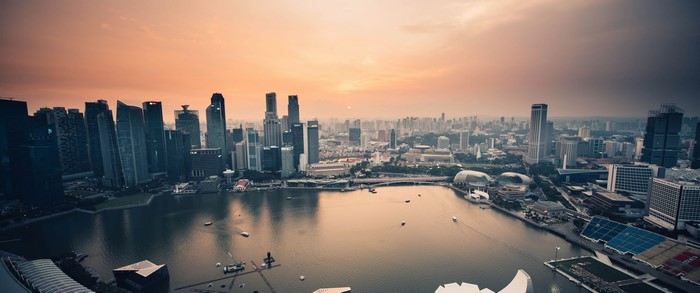 Singapore cityscape with bay at sunset