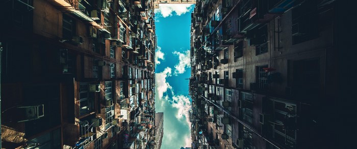 Apartment buildings in Hong Kong looking up at the sky