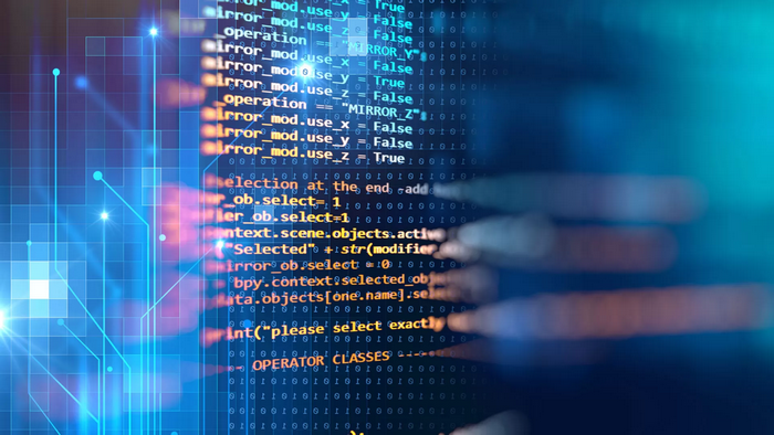 Programming code on a blue digital background